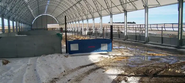 home-cor-1 Livestock hoop barn with ridge vent and feed awnings on both sides