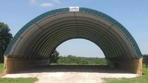 Clearspan hoop barn on a pony wall