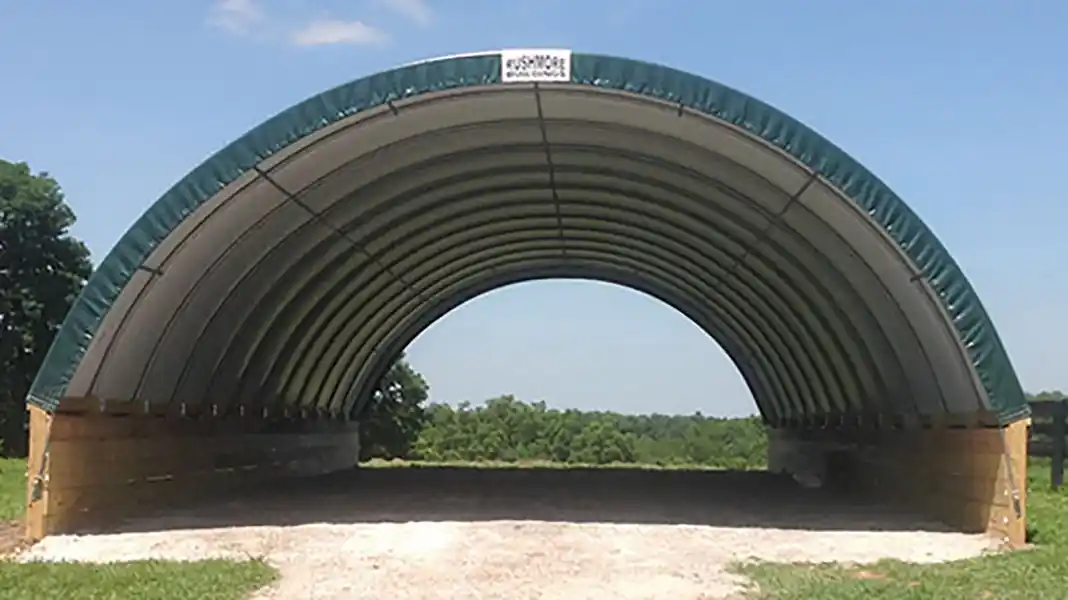 Clearspan hoop barn on a pony wall