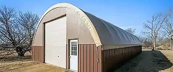 Neighbor's farm garage hoop with rollup and walk door